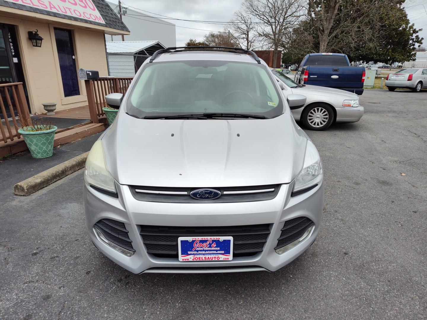 2014 Silver Ford Escape (1FMCU0GX7EU) , Automatic transmission, located at 5700 Curlew Drive, Norfolk, VA, 23502, (757) 455-6330, 36.841885, -76.209412 - Photo#3